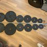 Barbell with 86kg worth of Domyos Weights with clips included. Image 2