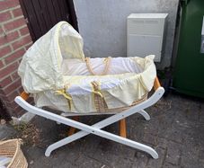 Moses basket on stand