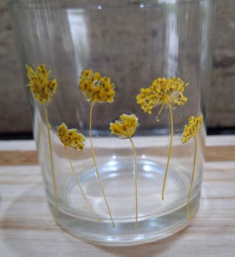 Decorative glasstealight holders on  wooden base