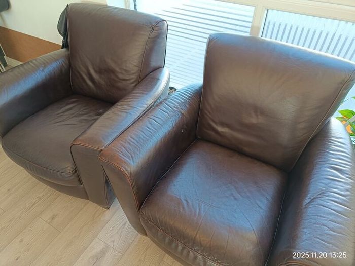 Leather armchairs are in very good condition.