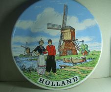 HOLLAND (Royal Schwabap) - a wall-hanging plate depicting windmills & couple in traditional Dutch costume (1984). Plate in pristine condition.