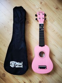 Pink ukulele with bag
