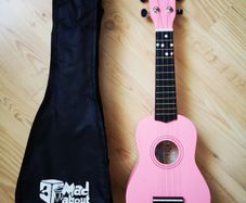 Pink ukulele with bag