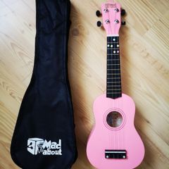 Pink ukulele with bag