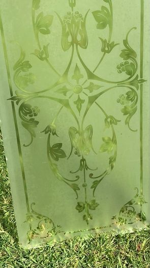 Acid etched glass panel