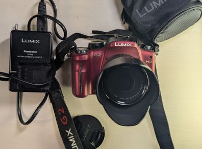 Panasonic Lumix DMC-G2 14mm-42mm Red including Charger and all cables.