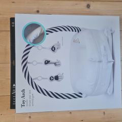 Dockatot Toy Arch and Toys
