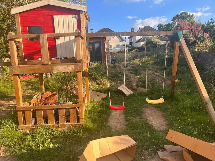 Play house with slide and climbing wall