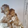 Boy and girl on bench Figurine Image 3