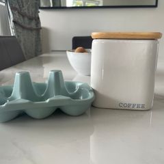 Ceramic coffee container with and egg holder