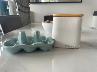 Ceramic coffee container with and egg holder
