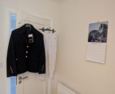 Women's showjumping jacket and jodhpurs