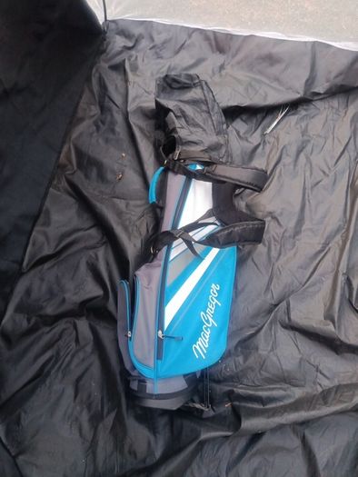 Kids carry golf bag