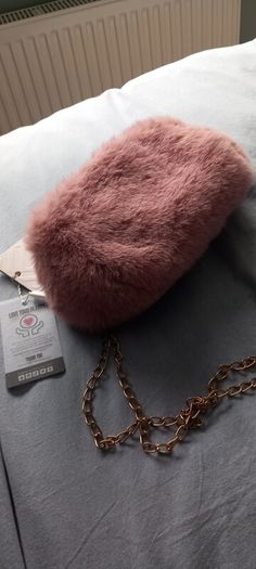 Faux fur pink shoulder clutch bag BNWT