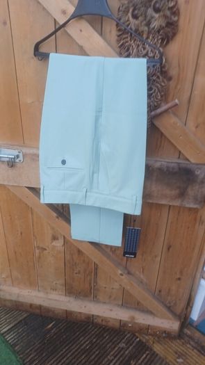 Druids sage colour golf jacket and trousers
