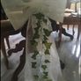 Faux Floral wedding chairs and ivy pew ends Image 3