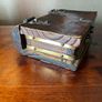 antique A wooden box in the form of a book, having brass escutcheon and black metal hinges. 18 x 15cm. Image 4