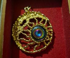 Vintage Ornate Goldtone Peacock Eye Pendant
