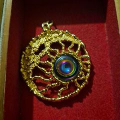 Vintage Ornate Goldtone Peacock Eye Pendant