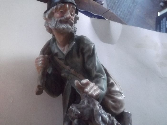 a lovely figurine of the man of the road