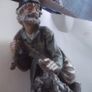 a lovely figurine of the man of the road Image 2