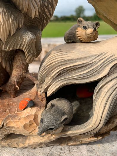 Adorable signed rustic tableau of hedgehog & sparrow having a chat, with hidey holes for tiny field mice. Hand carved, a special Christmas gift