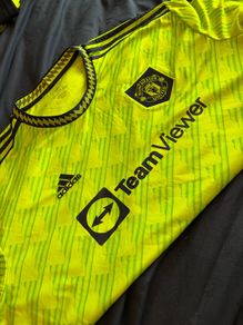 green  man utd jersey