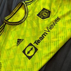 green  man utd jersey