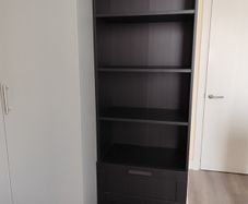 Shelf unit with drawers.