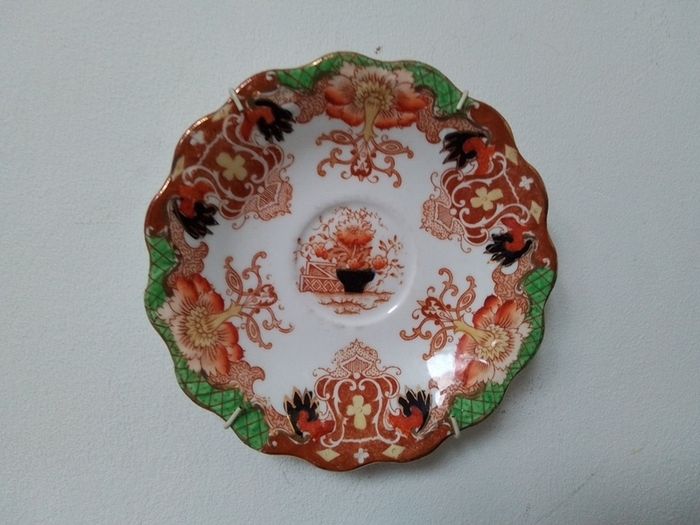 J.H.G.& Co. China Saucer
