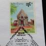 T-Rex Dinosaur collectors coin in vintage stamp cover Image 3
