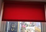 Red roller blinds