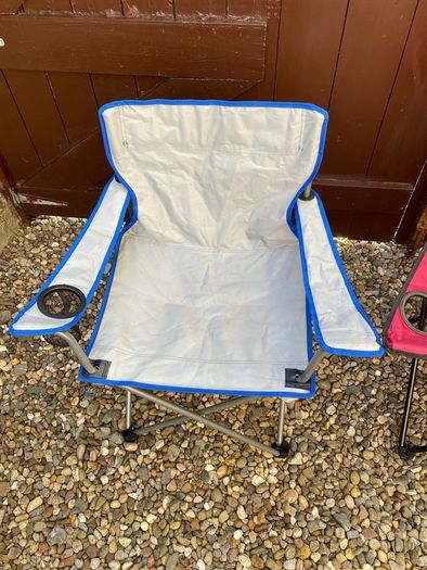 Brand new camping chair/sports chair with cup holder.