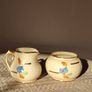 Collection of vintage milk pitchers and matching sugar bowls Image 2