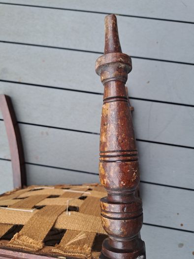 Vintage wooden chair with floral upholstery
