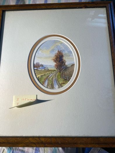 picture Country lane landscape featuring a whitewashed cottage, bare trees, and rutted track.