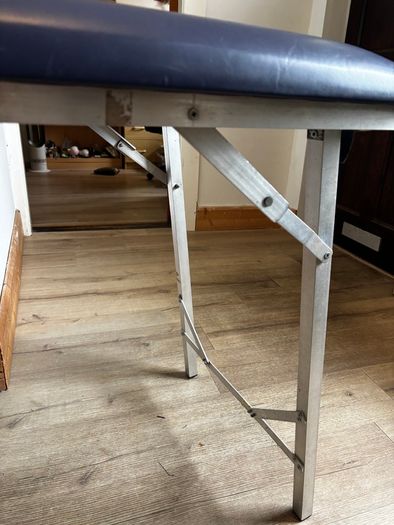 Massage table