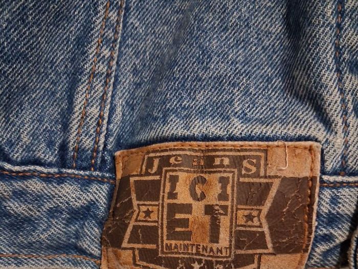 Vintage denim jacket with vintage metallica patch on back