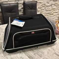 Pet carrier , dog
