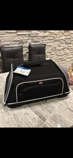 Pet carrier , dog