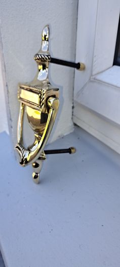 old brass door knocker