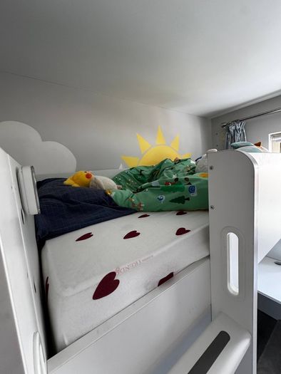 Bed with wardrobe and desk