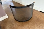 Contemporary black curved fire guard