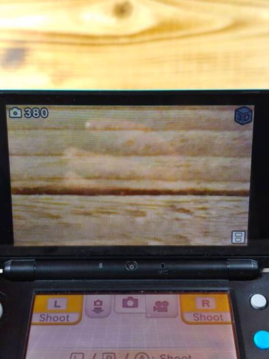 nintendo new 2ds xl with 4 games ,R buttons is not responding