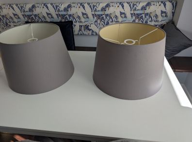 2 large grey lampshades
