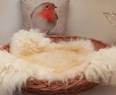 pet bed with sheepskin rug, made of wicker ,