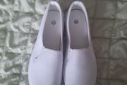 white canvas slip ons