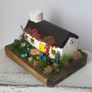 Handcrafted tiny wooden cottage Image 2