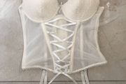 Cream corset with detachable suspenders