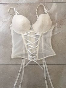 Cream corset with detachable suspenders